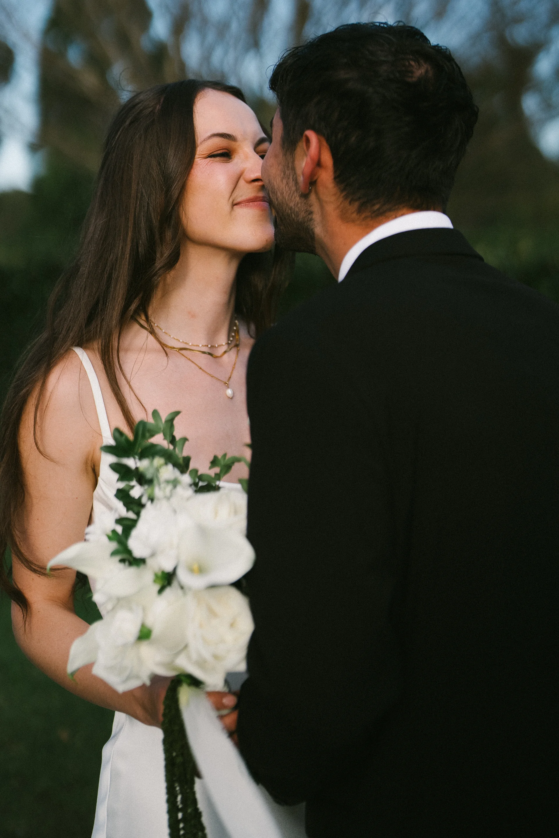 A quiet word between partners, photographed candidly, Sydney